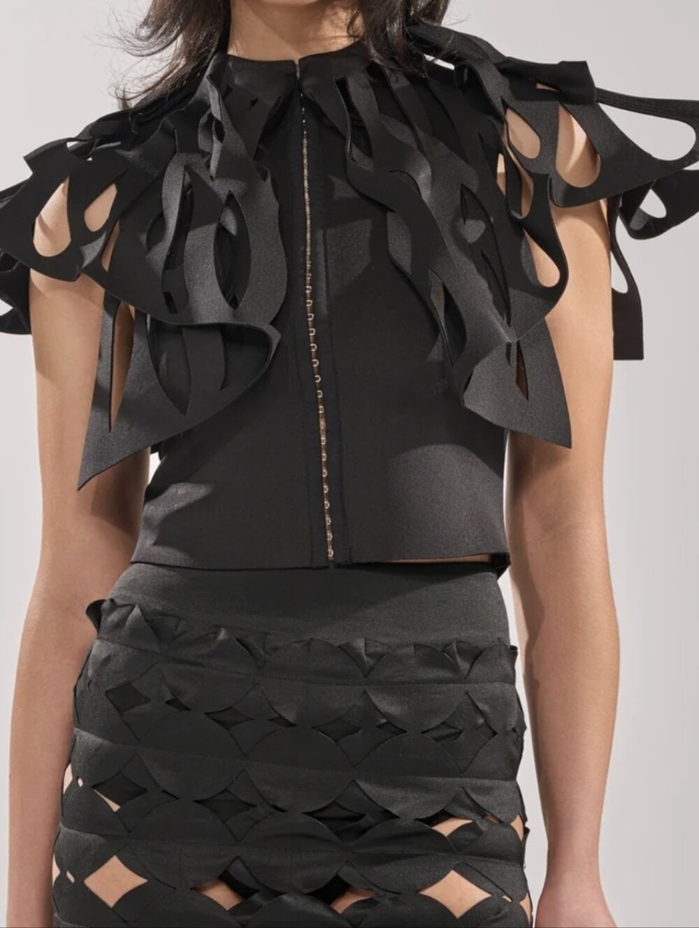 Akira Black Cutout Statement Top